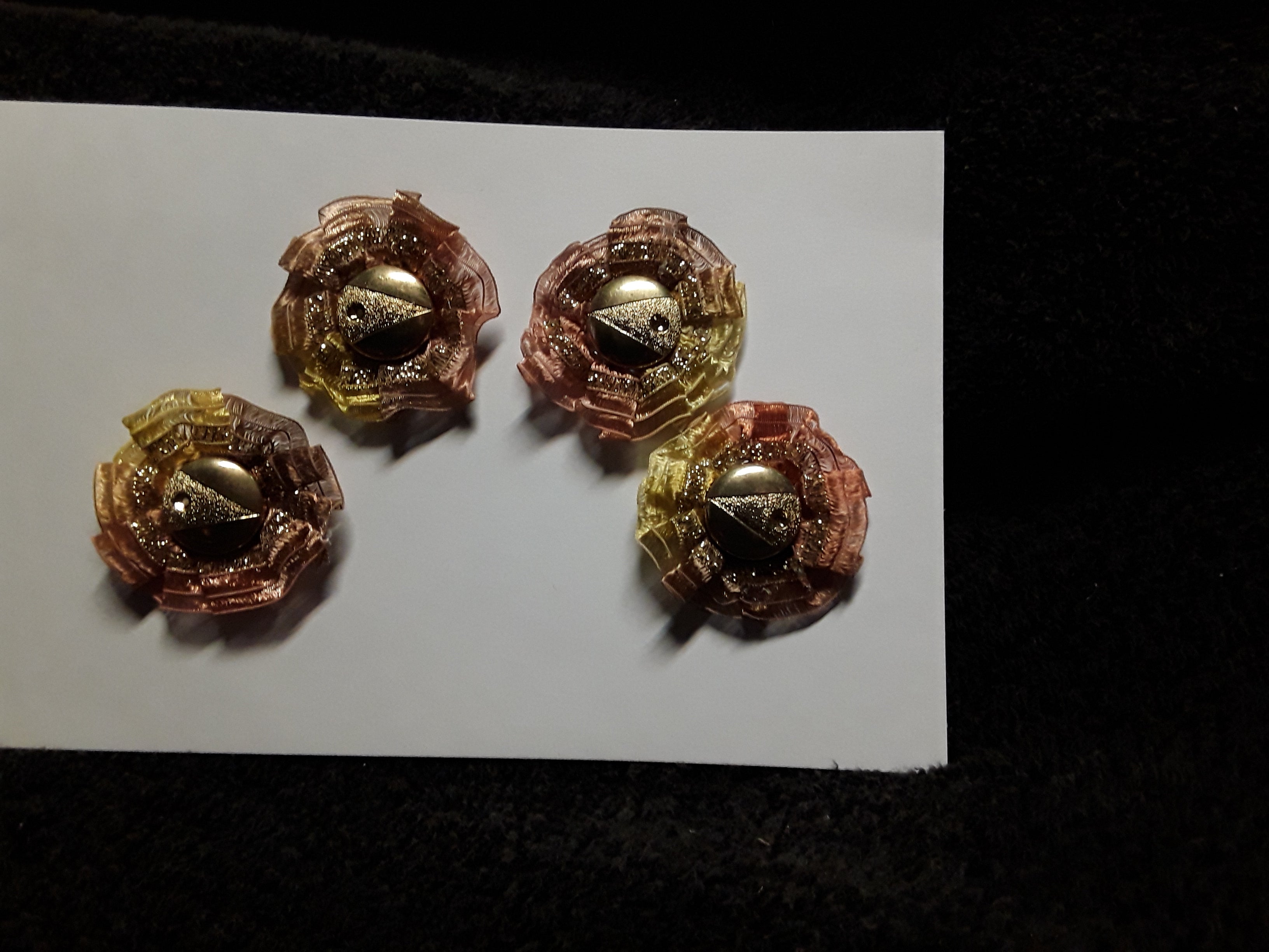 Four Earthy Colored Little Button Flowers